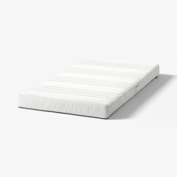 A white baby mattress by JÄTTETRÖTT, rectangular and quilted with a zip.