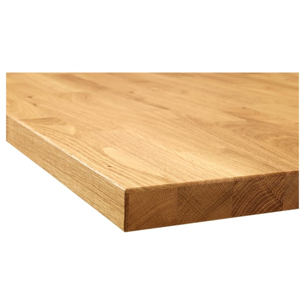 Smooth, light wooden worktop with fine grain texture and rounded edges.
