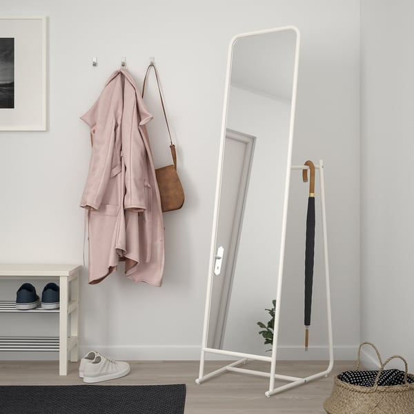 KNAPPER white mirror with hooks & rail, sized between a coat rack & a tall plant.