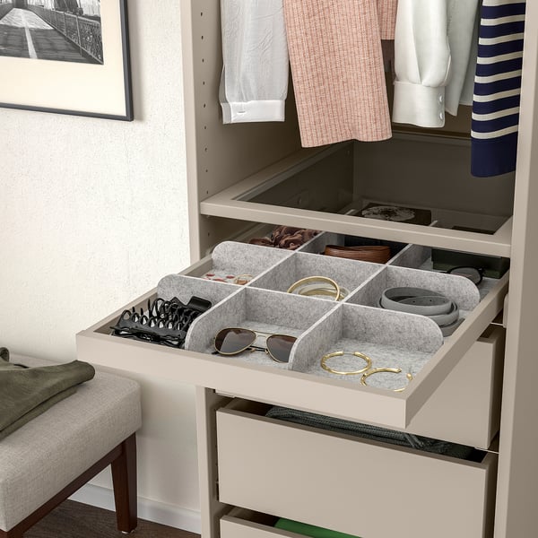 Organised drawer with multiple compartments for small accessories like belts and jewellery, pulls out for easy access.