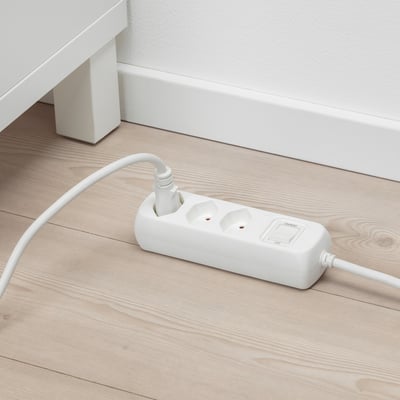 White surge protector with 3 grounded sockets and safety shutters.