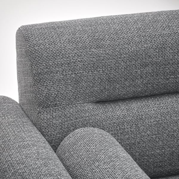 Close-up of a modern, grey sofas cushioned section, showcasing its textured, durable fabric and plush, inviting design.