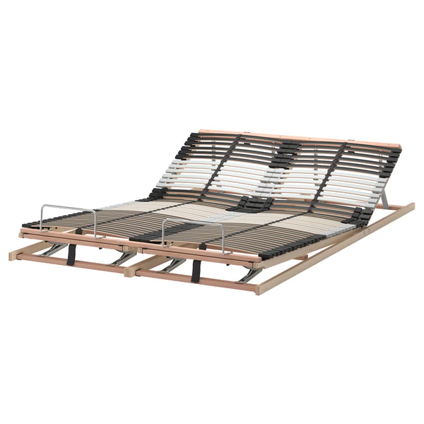 LEIRSUND adjustable bed base with wooden frame, curved slats, and adjustable firmness zones for spine alignment.