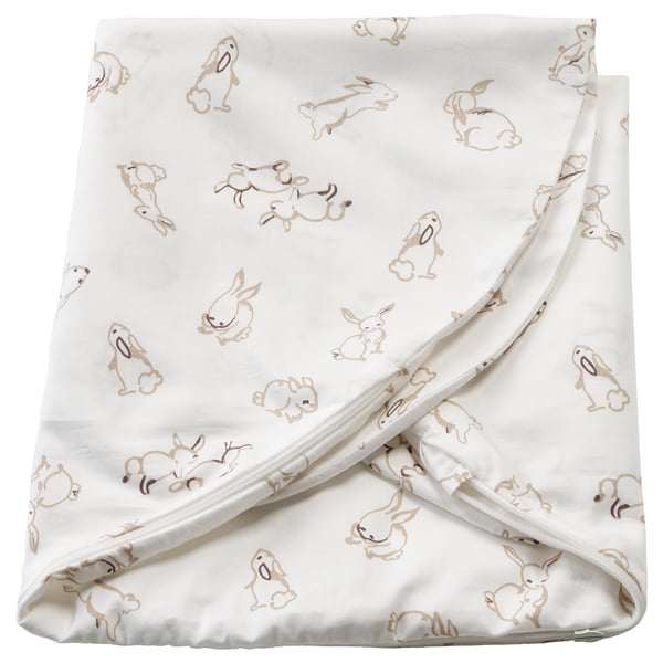 White blanket with beige bunny patterns, soft cotton, square shape, cute design.