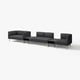 Modern black modular sofa set with sleek lines, featuring multiple upholstered sections. Perfect for contemporary living spaces.