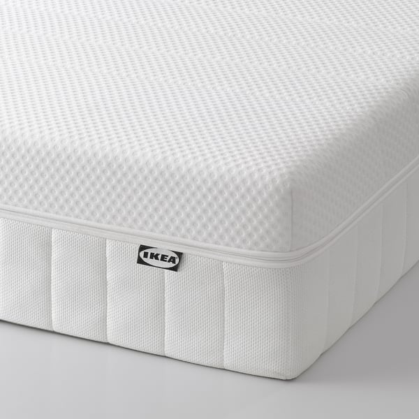 Ikea MAJSKÄR electric foam mattress with adjustable head area, white and soft texture, quality brand logo visible on side.