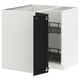 Modern white kitchen cabinet with black handles and shelves.