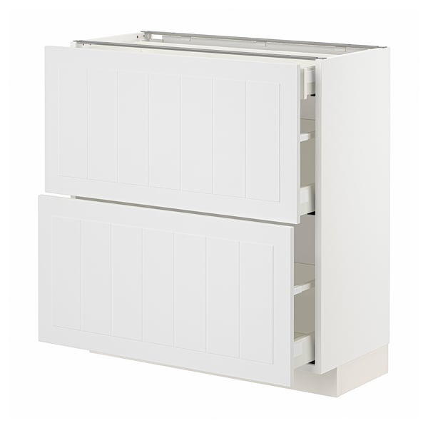 A white METOD cabinet with two large drawers and a door above.