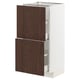White METOD kitchen cabinet with dark brown sinarp drawers and oak veneer.