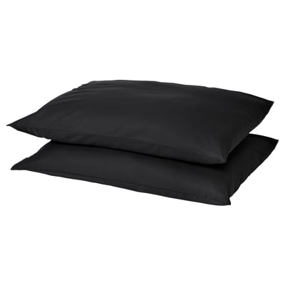 Two black square pillows stacked, smooth dark fabric, simple design.
