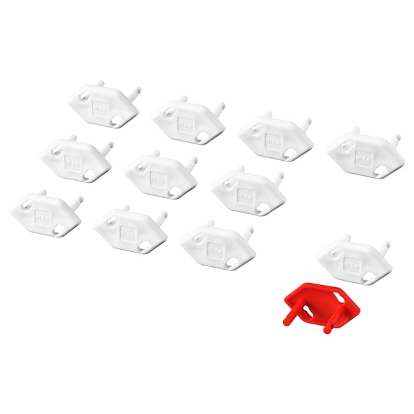 Set of white and one red PATRULL safety plugs for wall sockets.