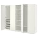 A white ikea PAX wardrobe with open doors, revealing shelves and a basket.