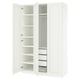White PAX wardrobe with open doors revealing shelves and drawers.