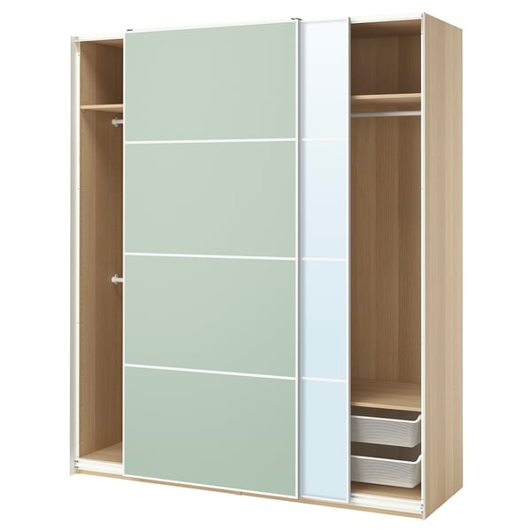 Modern PAX wardrobe with light green and white glass doors, light wood frame, and organiser drawers.