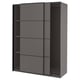 A modern dark grey sliding wardrobe named PAX. It sleek, minimalist design with two sliding doors and multiple shelves inside.