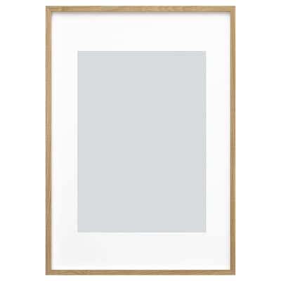 Blank frame in light wood, square shape, minimalist design. Display art or photos simply.