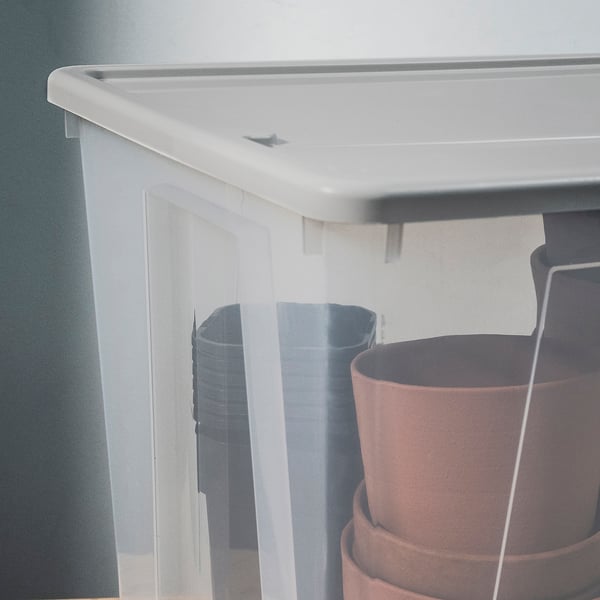 Clear plastic organiser with a grey lid, showing stacked bins for efficient storage.