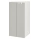 A white SMÅSTAD wardrobe, designed for children. Its square-shaped with two doors, soft-closing hinges, and adjustable feet for stability.
