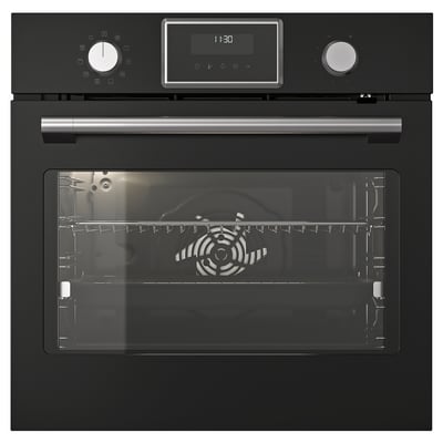 Black IKEA STENABY oven with digital display, stainless handle, multi-level racks, and steam function.