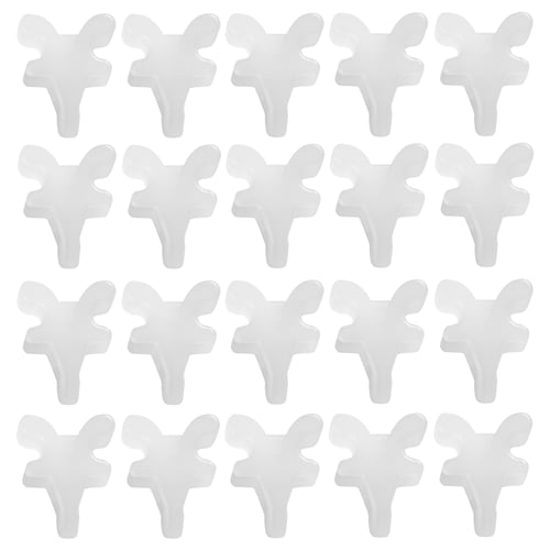A grid of 25 white, star-shaped plastic TRÖSTA connectors. Uniform in design and material, arranged neatly.