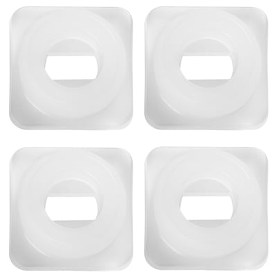 Four white square TRÖSTA polyethylene plastic coasters with a circular indentation in the centre, arranged neatly in a 2x2 grid.