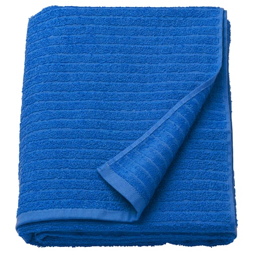 Folded bright blue VÅGSJÖN towel with stripe pattern and terry texture.