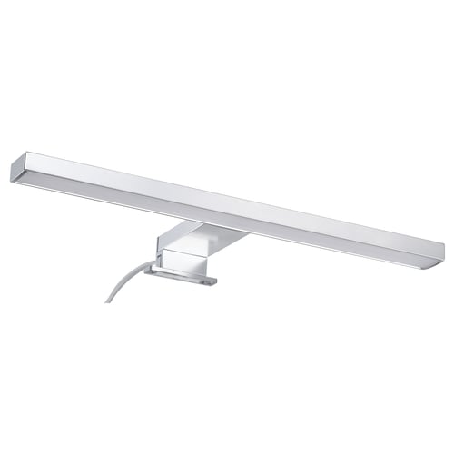 A VÅTHULT wall lamp, a sleek, silver, rectangular, modern design with led lighting ideal for bathroom use.