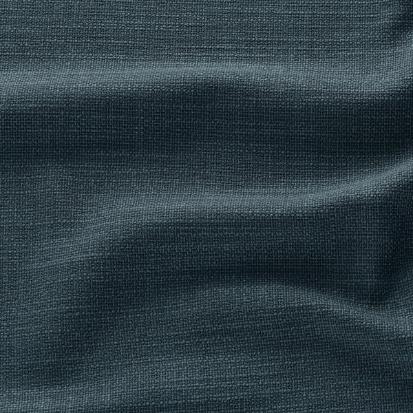 Soft, high-quality fabric close-up. Light blue tones, textured weave, suggesting comfort and durability.