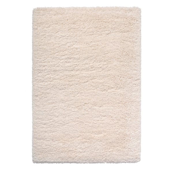 A beige, rectangular, shaggy rug with varied texture, made of recycled polyester and polypropylene.