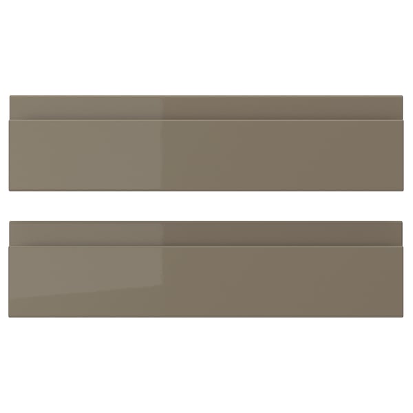 Two brown drawer fronts of VOXTORP design, sleek and modern with glossy finish and integrated handles.