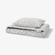 BJÖRKGRÅMAL Funda plumón con funda almohada, negro blanco/lunares, 150x200/50x60 cm