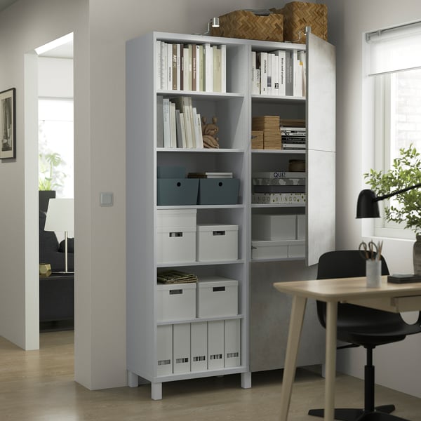 BESTÅ Mueble sala con puertas, blanco Kallviken/Stubbarp/gris claro Efecto cemento, 120x42x202 cm