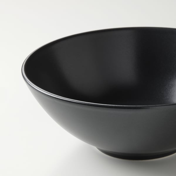 Elegantní matná černá miska, hladký okraj, pevná kameninová kvalita, ideální na servírování.