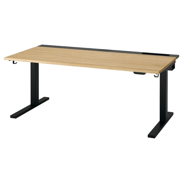 Polohovací stůl MITTZON s deskou ze světlého dřeva a černými kovovými nohami. Nastavitelný, elegantní a moderní design.