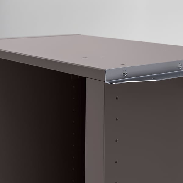 Moderní rohový díl úložné skříně, elegantní kovový design, kvalitní zpracování.