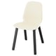 Židle SKÅLSTA , krémová, plastový sedák, černé kovové nohy, minimalistický design.