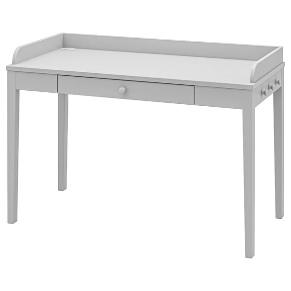Bílý dřevěný psací stůl SMYGA se zásuvkou a bočními úchytkami. Tradiční design, zúžené nohy, velká pracovní plocha.