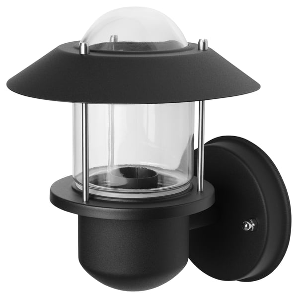 Černá nástěnná lampa UPPLID s čirým skleněným stínidlem, ocel & polykarbonát. Kulatý, moderní design, vhodný pro venkovní použití.