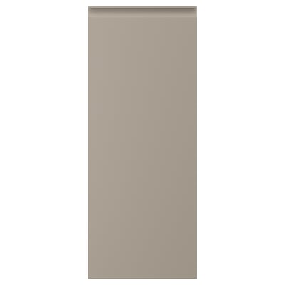 Béžová dvířka kuchyňské skříňky se zapuštěnými klikami. Obdélníkový, plochý, elegantní design.