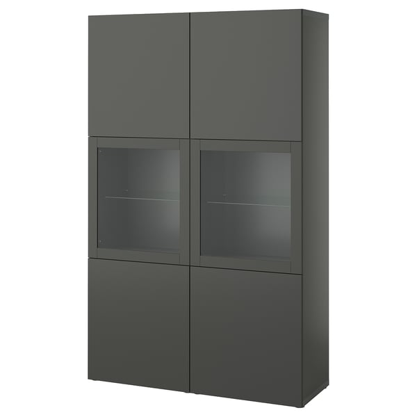 An ikea BESTÅ dark gray cabinet with glass doors and shelves. It a modern design with sleek lines and adjustable storage.