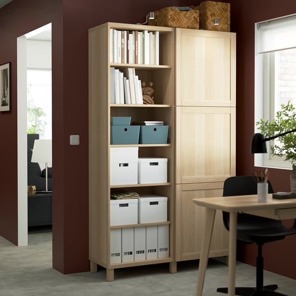 BESTÅ storage unit with books & decor.