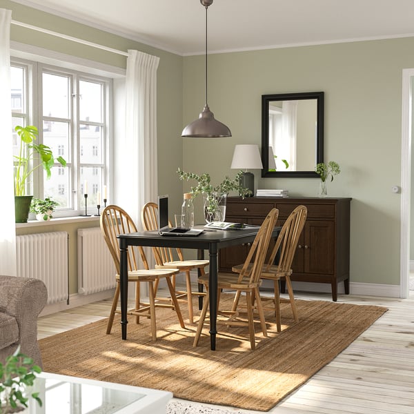 Modern dining with DANDERYD table & chairs, natural wood, by large window. Light green walls, wooden floors, pendant light.