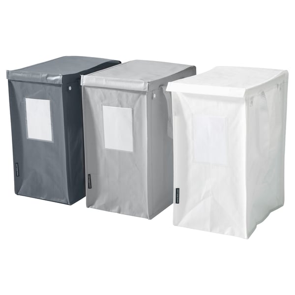 Three DIMPA waste sorting bags in black, light grey, and white. They are rectangular, durable, with side handles and clear label pockets.