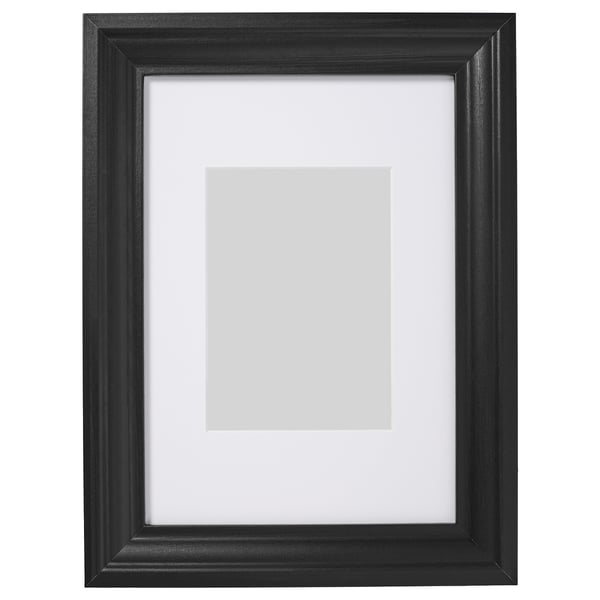 Black picture frame with white mat, rectangular, traditional design.