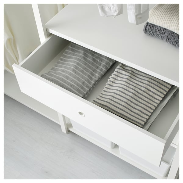 Open white drawer with striped towels, soft-closing mechanism visible.