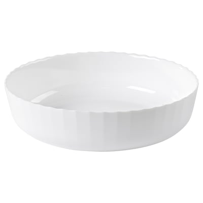 White round ceramic dish with flared edges.