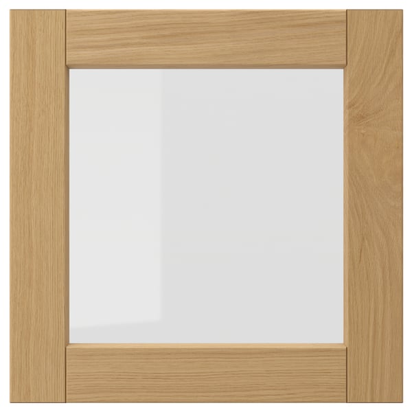 Square wooden frame in warm oak with clear glass centre, classic design.