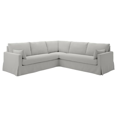 Light grey corner sofa, clean modern design with cushions, comfortable for relaxation.
