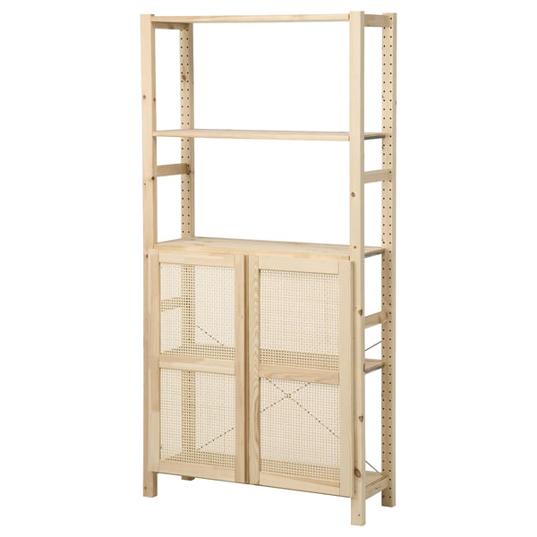 IVAR light wood storage unit: tall, rectangular, with adjustable shelves, featuring two bamboo doors, perfect for living rooms or kitchens.
