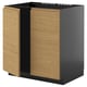 Modern kitchen cabinet with wooden door panels and black frame.